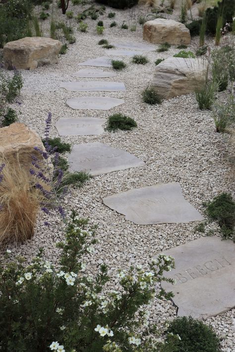 Yesterday we showcased a stunning feature stone, today we’re showcasing our Durlston Stepping Stones. In this wonderful garden, they have been used to create a winding pathway, complimented by a beautifully matched aggregate surround. This tranquil space, appropriately named, The Peace Garden by @mcwilliamstudio has been deservedly shortlisted for the @societyofgardendesigners 2025 awards. Huge congratulations! 🌿 Credits - Garden Design & Photographs - @mcwilliamstudio Landscape Contracto... Curved Stepping Stone Path, Stepping Stones In Gravel, Stone And Paver Walkway, Flagstone And Gravel Patio, Pea Gravel Walkway With Stepping Stones, Mexican Farmhouse, Stepping Stone Path, Leaf Stepping Stones, Stepping Stone Pathway