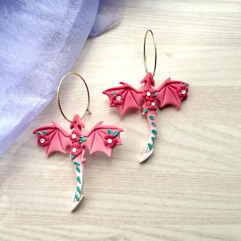 I only have one pair of pink sakura dragon earrings in my shop. This cutter hates me so until I figure it out this is the only pair available. (I have this cutter since last year. I'm quite frustrated with it 😩) Pink Clay Crafts, Polymer Clay Cherry Blossom, Earrings Made Of Clay, Diy Earrings Fimo, Polymer Clay Earrings Diy Ideas, Sakura Dragon, Cherry Blossom Dragon, Diy Polymer Clay Earrings, Clay Earrings Diy