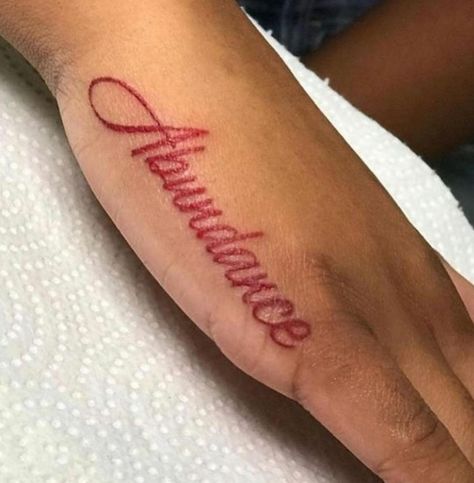 Names In Red Ink Tattoo, Red Name Tattoos For Women, Red Ink Font Tattoo, Red Name Tattoo, Red Ink Writing Tattoo, Blessed Red Ink Tattoo, Red Tattoos On Brown Skin, Red Names, Basic Tattoos