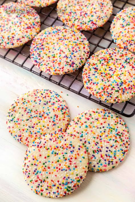 Rainbow Sprinkle Cookies are fun, colorful cookies that are easy to make with the family. Sharing these rainbows with friends is a delight! #RealHousemoms #sugarcookies #rainbow #sprinkles #cookies #dessert #birthdayparty #mothersday #kidapproved Sprinkle Crinkle Cookies, Snacks With Sprinkles, Publix Sprinkle Cookie Recipe, Sprinkle Cookies Recipe Easy, Sprinkled Sugar Cookies, Rainbow Chip Cookies, Sugar Cookies With Sprinkles On Top, Dessert With Sprinkles, Rainbow Sprinkle Cookies