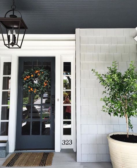 Porch ceiling painted black. Light grey siding Exterior Doors With Glass, Porch Ceiling, Entrance Ways, Casa Exterior, Front Door Colors, Front Entrances, House Paint, Studio Mcgee, Exterior Paint Colors