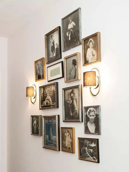 Hallway Picture Display, Gallery Wall With Sconces, Hallway Photography, Cubicle Style, Gallery Wall Lighting, Pond Lighting, Cozy Cubicle, Hallway Pictures, Beach Lighting