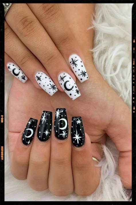 Black Acrylic Nails With Moon And Stars, Moon And Star Acrylic Nails, Moons And Star Nails, Black And White Moon And Stars Nails, Black Nail Designs Moon And Stars, Moon And Star Nails Acrylic Black, Moon On Nails Art Designs, Black Nails With Moon Design, Black Skull Nails Acrylic