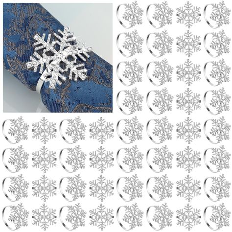 PRICES MAY VARY. What you can receive: you can receive 48 pieces of snowflake napkin rings, the diameter of each snowflake is about 1.77 inches/ 4.5 cm, the diameter of napkin buckle part is about 1.69 inches/ 4.3 cm, suitable for most napkin cloths to keep a good shape; The number of the package is enough for you to decorate your Christmas table, which is a cost-effective choice Glittering rhinestone design: the snowflake napkin holder is design with hexagonal snowflake shape; The snowflake pat Snowflake Wedding Decor, Snowflake Wedding Decorations, Snowflake Napkin Rings, Dinner Table Set Up, Winter Table Decorations, Rings Holder, Napkin Rings Diy, Christmas Wedding Party, Snowflake Wedding