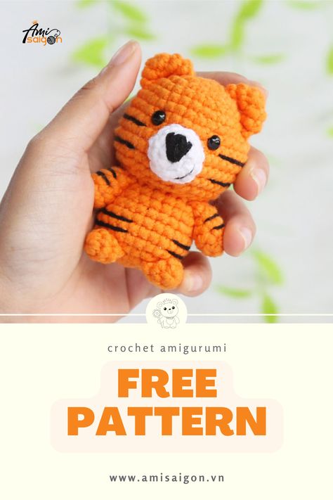 If you’re searching for a little amigurumi to make a keychain or decorate your backpack, this little tiger amigurumi is prepared to come to your home. Perfect for beginners, this adorable and easy-to-follow pattern will bring the wild charm of a tiger into your crochet collection. Let’s start stitching and unleash the creativity! Crochet Mini Tiger Free Pattern, Crochet Tiger Keychain, Crochet Tiger Pattern Free, Tiger Crochet Pattern Free, Cat Bag Pattern, Decorate Your Backpack, Tiger Keychain, Make A Keychain, Tiger Crochet