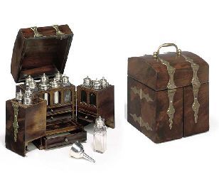 A mid 18th-Century Continental mahogany domestic medicine chest with ornamental brass strap-work and inlay, of trunk style with domed lid and double doors to the front, the interior with marquetry decoration throughout and fenestrations to reveal contents of bottles, the doors with two drawers surmounted by fitted area housing four bottles, the central upper section partitioned to house a further five similar bottles and two silver canisters... Kitchen Chest, Kitchen Box, Medicine Chest, Apothecary Cabinet, Medical Kit, Spice Box, Vintage Medical, Camp Kitchen, Prop Design