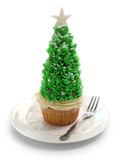 These Christmas Tree Cupcakes are the perfect holiday treat to make for Christmas parties. Made with cupcakes, ice cream cones, frosting and some fun toppings, they are sure to be a conversation starter! #christmastree #christmastreecupcakes #christmascupcakes #treecupcakes #christmaspartyideas Grinch Food Ideas, Grinch Food, Simple Christmas Ideas, Xmas Cupcakes, Tree Cupcakes, Christmas Tree Cupcakes, Christmas Cake Ideas, Sugar Cones, Grinch Party