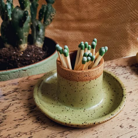 A beautiful wheel-thrown match striker constructed from stoneware. The unglazed surface allows you to light 'strike anywhere' matches with a simple flick of the wrist. Attached dish holds burned matches to protect your surfaces. Includes 30 matchsticks. Pottery Wheel At Home, Unglazed Ceramics, Beginner Wheel Throwing Projects, Functional Wheel Thrown Pottery, Wheel Throwing Ideas Beginner, Ceramics Wheel Ideas, Thrown Ceramics Ideas, Wheelthrowing Pottery Ideas, Easy Wheel Thrown Pottery