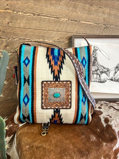 Twisted Buckle Buffalo Bandit Saddle Blanket Purse – theFRINGEDpineapple Western Purse Storage, Saddle Blanket Purse Pattern, Southwestern Hand Tooled Bags For Everyday Use, Brown Southwestern Style Shoulder Bag For Everyday Use, Southwestern Style Tote Bag For Everyday Use, Southwestern Style Everyday Tote Bag, Southwestern Style Bag With Adjustable Strap, Southwestern Style Bag With Adjustable Strap For Everyday Use, Southwestern Style Bags With Adjustable Strap For Everyday Use