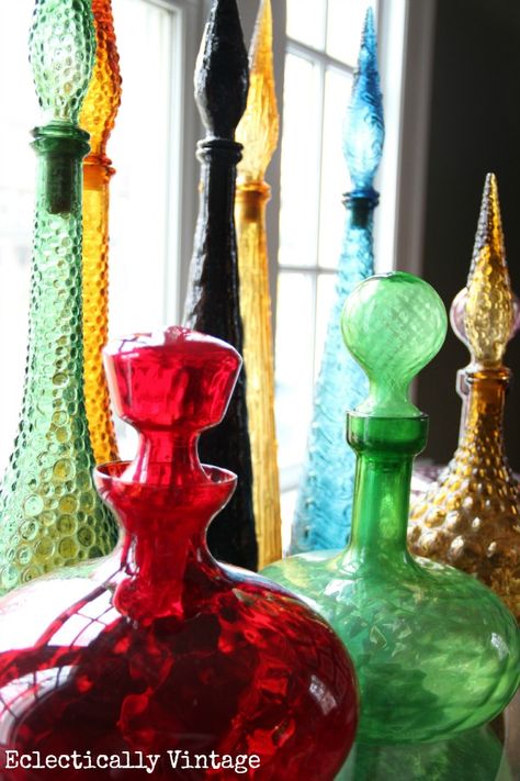 These mid century decanters are bright, bold and colorful. Vibrant colors, unique patterns (hobnail, wave, optic) and fun shapes. Cool Collections, Mid Century Glass Vase, Glass Shelves Decor, Mid Century Art Glass, Colored Glass Bottles, Diy Step, Mid Century Italian, Diy Step By Step, American Ceramics