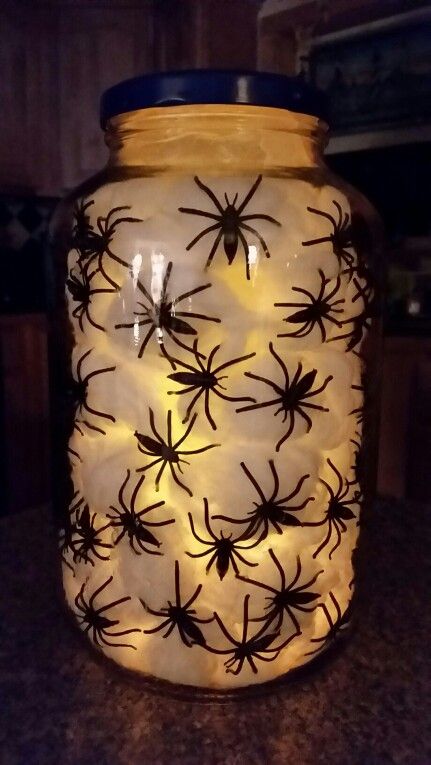 Halloween Jar Filler Ideas, Halloween Jars Creepy, Halloween Head In A Jar Diy, Cheese Ball Container Crafts, Halloween Glass Jars, Witches Trunk Or Treat Ideas, Halloween Tip Jar, Empty Jars Ideas Diy, Bathroom Halloween Decor