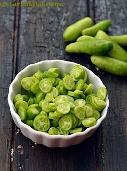 Tendli, Ivy Gourd Glossary | Recipes with Tendli, Ivy Gourd | Tarladalal.com Ivy Gourd, Gujarati Cuisine, Maharashtrian Recipes, Pumpkin Family, Pickling Recipes, Indian Cooking, Pressure Cooking, Vegetable Dishes, Recipe Using