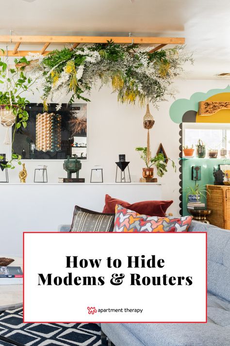 Discover how to hide unsightly Wi-Fi modems and routers with these designer tips. Hiding Electronics Living Rooms, Wifi Hiding Ideas, Hide Router And Modem Wall, Internet Router Shelf, Hide Cords Behind Tv, How To Hide Internet Router And Cords, Intercom Cover Ideas, Ideas To Hide Wifi Router, Hiding Internet Router