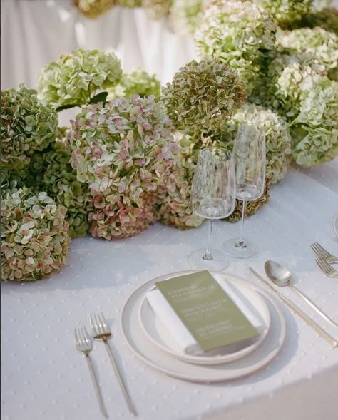 Clam Shell Flower Arrangements, Pink And Green Hydrangea Centerpiece, Dried Hydrangeas Decor Ideas Wedding, Antique Green Hydrangea, Textured Wedding Table Linens, Hydrangea Table Arrangements Wedding, Wedding Ideas Hydrangea, Hydrangeas At Wedding, Wedding Table Set Up Without Plates