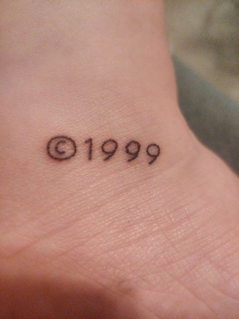 Ankle tattoo, it has a © followed by the year 1999. I was born then :) 1999 Tattoo, Cool Arm Tattoos, 23rd Birthday, Arm Tattoos, Print Tattoos, Arm Tattoo, Paw Print Tattoo, Fish Tattoos, Jesus Fish Tattoo