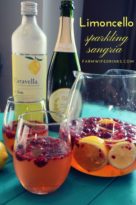 Limoncello Sparkling Sangria - The Farmwife Drinks Limoncello Sangria Recipe, Lemon Cello Recipe, Lemon Sangria, Sangria Party, Sparkling Sangria, White Sangria Recipe, Rose Sangria, Frozen Raspberries, White Sangria