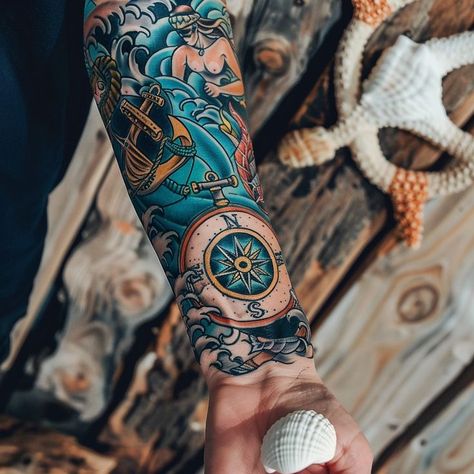 Detailed maritime-inspired tattoo sleeve featuring a compass, anchor, and vibrant nautical elements on a person's arm. Marine Life Tattoo, Nautical Sleeve, Marine Tattoo, Anchor Wall Decor, Nautical Elements, Pirate Tattoo, A Compass, Tattoo Sleeve, Deep Love