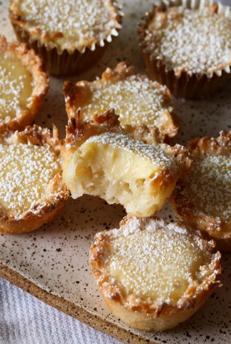 These sweet Lemon Coconut Tassies have a coconut macaroon-style crust with a sweet homemade lemon filling. Easy to make, great to freeze, and perfect for entertaining! #cookiesandcups #imperialsugar #partner Lemon Tassies, Summer Baked Goods, Baking Biscuits, Cookies And Cups, Lemon Dessert Recipes, Lemon Coconut, Sweet Lemon, Coconut Macaroons, Coconut Recipes