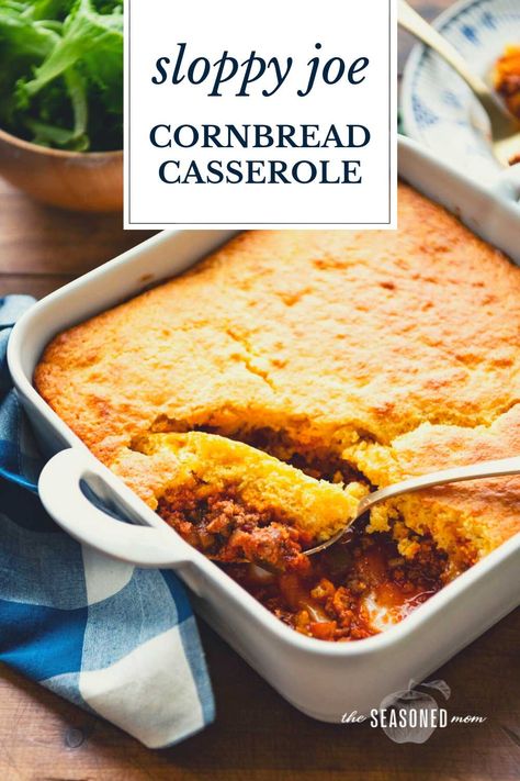 This Sloppy Joe cornbread casserole is an easy dinner recipe that the entire family will love! An affordable sweet and tangy ground beef filling is finished with a golden brown Jiffy cornbread topping. Serve the casserole with a simple green salad for a quick weeknight meal! Cornbread Sloppy Joe Casserole Jiffy, Sloppy Joe Casserole Cornbread, Ground Beef Cornbread, Dinner Using Ground Beef, Cornbread Casserole Jiffy, Sloppy Joe Cornbread Casserole, Sloppy Joe Cornbread, Cornbread Topping, Cornbread Casserole Recipe