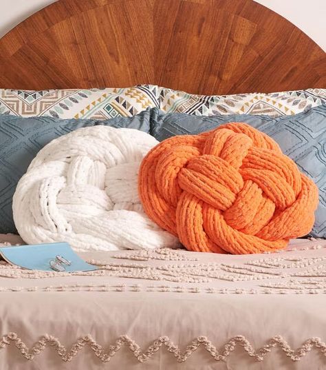 How To Make Knit Sophisticated Knot Pillows Online | JOANN Knot Pillow Pattern, Yarn Pillow, Knot Pillows, Knot Blanket, Anchor Embroidery, Crochet Pillow Pattern, Knot Pillow, Crochet Abbreviations, Finger Knitting