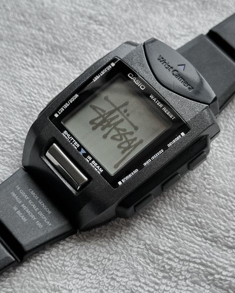 The story of Casio Wrist Camera Watch 2000 The Casio Wrist Camera, also known as the Casio WQV-10, was a pioneering product in wearable technology. Launched in 2000, it was the world's first wristwatch to integrate a digital camera. With a resolution of 120 x 120 pixels, it could store 100 black-and-white images, heralding a new era for miniaturized technology. Despite its limitations in image quality and storage capacity, the Casio Wrist Camera marked a significant milestone, demonstratin... Digital Analog Watch, Camera Watch, Old Technology, White Images, Ring Watch, Black N White Images, Analog Watch, Wearable Technology, Digital Watch