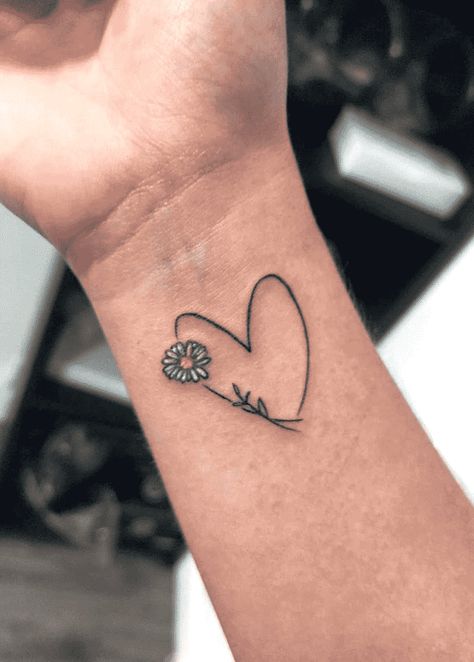 Daisy Tattoo Design Images (Daisy Ink Design Ideas) Butterfly And Daisy Tattoo, Tattoo Ideas Daisy, Flower Heart Tattoo, White Daisy Tattoo, Daisy Tattoo Ideas, Tattoos Pequeños, Xmas Breakfast, Daisy Chain Tattoo, Small Daisy Tattoo