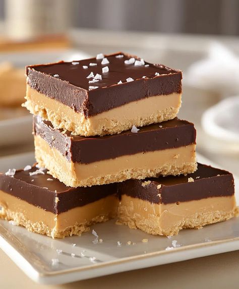 No-bake Peanut Butter Buckeye Bars Recipe - avarecipes.com No Bake Buckeye Bars Recipe, No Bake Buckeye Bars, Buckeye Bars Recipe Easy, Peanut Butter Cookie Bars Recipes, Peanut Butter Chocolate Recipes, Buckeye Bark Recipe, Peanut Butter Bars No Bake, Buckeye Bark, Banana Cream Cupcakes