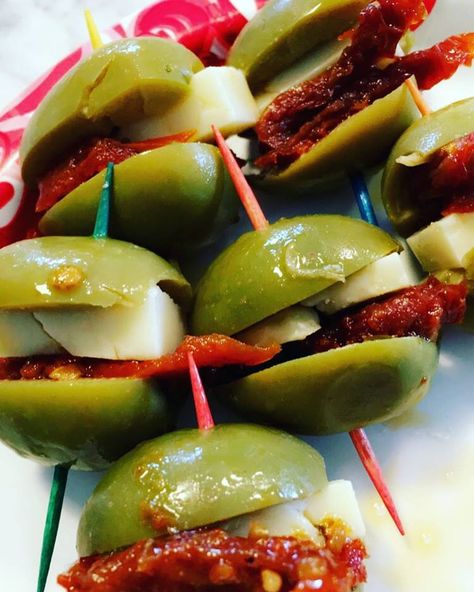 My husband ate our weight in olives in Spain and these stuffed olives were some of our favorites! Stuffed Olives Party Appetizers, Green Olive Appetizer Ideas, Stuffed Olives Recipe, Olives Appetizer, Tini Party, Basque Food, Cocktail Party Appetizers, Stuffed Olives, Spanish Olives