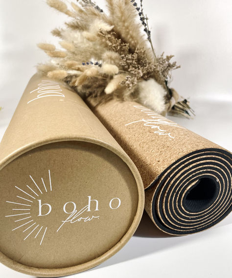 Image shows a close up of the Boho Flow cork yoga mat rolled up and placed next to the recycled tube packaging. Yoga Mat Packaging, Yoga Pad, Cork Yoga Mat, Yoga Products, Bohemian Bag, Yoga Mats Design, Boho Yoga, Natural Tree, Bohemian Bags