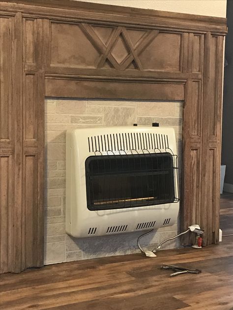 Vintage mantle with gas heater. Repurposed mantle Gas Wall Heater Makeover, Wall Heater Cover, Propane Wall Heaters, Propane Gas Fireplace, Wall Heater, Faux Fireplace Mantels, Fake Fireplace, Basement Remodel Diy, Faux Fireplace Diy