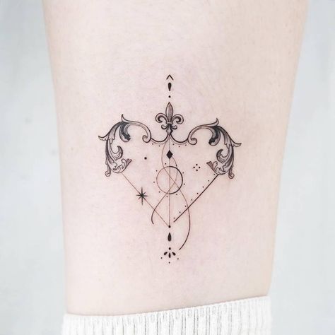 Heart shaped bow and arrow tattoo located on the ankle. Matching Bow And Arrow Tattoo, Cupid Bow And Arrow Tattoo, Cupid Bow Tattoo, Cupid Arrow Tattoo, Heart And Arrow Tattoo, Ornamental Filigree, Bow And Arrow Tattoo, Sagittarius Tattoos, Heart Arrow Tattoo