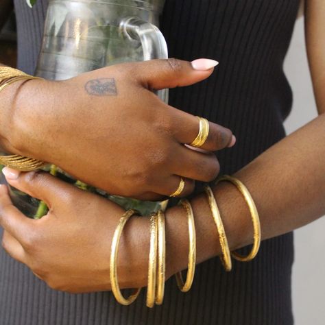 A fully rounded bangle has arrived to the site! I've been really trying to find a way to make a nice substantial bangle and I think this is it! This bangle is named after my paternal aunt, the oldest of my father's siblings, who happened to transition a few years back on my birthday. She was a stern woman who played no Gold Bangles Black Women, Gold Bangles Aesthetic, Stern Woman, Bangles Aesthetic, Single Bangle, Gold Bangle Bracelets, Bangles And Bracelets, Lots Of Jewelry, On My Birthday