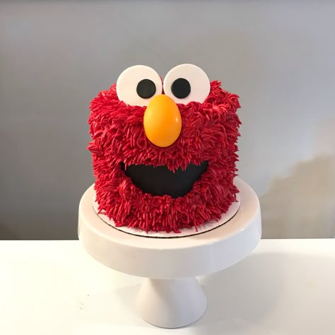 Small Elmo Cake, Cowboy Elmo Birthday Party, Sesame Street Buttercream Cake, Elmos World Birthday Cake, Elmo Cake Diy, Buttercream Sesame Street Cake, Elmo Birthday Party Boy Cake, Easy Elmo Cake, Elmo First Birthday Cake