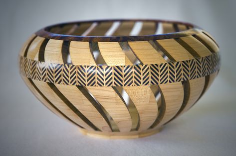 A 9.25” Maple segmented lattice bowl. The pattern ring is made form Walnut and Maple, the rim and centre-piece ring are made from Pomelle Sapele. Segmented Turning, Woodworking Lathe, Pattern Ring, Wood Turning Projects, Wood Lathe, Lathe, Wood Creations, Wood Bowls, Centre Pieces