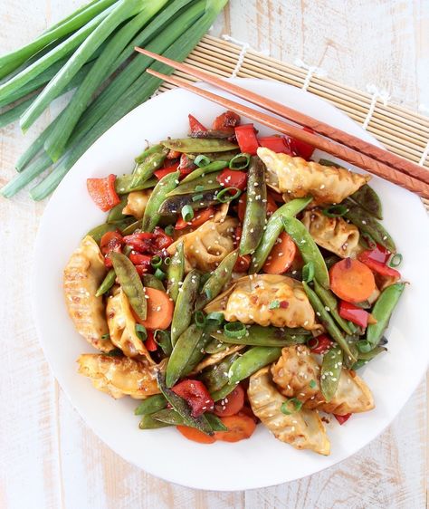 Chicken Potsticker Stir Fry Recipe - WhitneyBond.com Pot Sticker Stir Fry Recipe, Potsticker Stir Fry Recipe, Potsticker Stir Fry, Simple Stir Fry Sauce, Chicken Potstickers, Simple Stir Fry, Chinese Meals, Stir Fry Sauce Easy, Potstickers Recipe