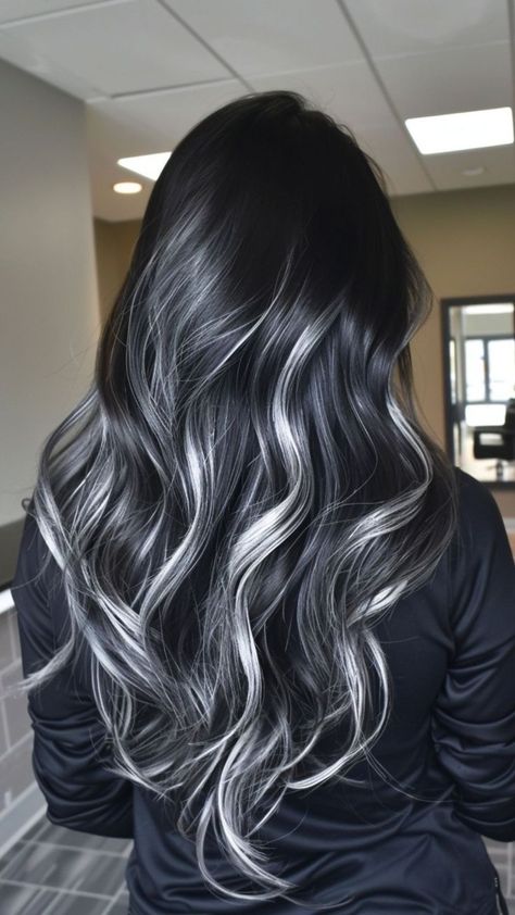 Achieve a breathtaking balayage look with striking black highlights and shimmering silver hair color! This trendy style adds depth and dimension, creating a beautiful contrast that is perfect for any occasion. Our premium hair extensions make it easy to sport this fabulous color. Enjoy a special 22% off for Halloween with code P22! Elevate your hair game today and dazzle everyone with your stunning new style! #Balayage #BlackHighlights #SilverHair #HairExtensions #HairColorInspo Black Hair With Silver Lowlights, Long Black And Silver Hair, Black Hair With Streaks Of Blonde, Black Lowlights In Light Brown Hair, Black Hair Silver Extensions, Black Hair Platinum Balayage, Black Hair With Dark Grey Highlights, Black To Grey Balayage, Black With Low Lights Hair