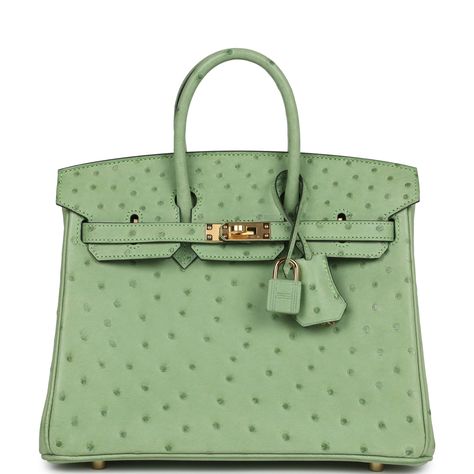 This Birkin is in Vert Criquet ostrich with gold hardware and features tonal stitching, front flap, two straps with center toggle closure, clochette with lock and two keys, and double rolled handles.The interior is lined with Vert Criquet chevre and has a zip pocket with an Hermes engraved zipper pull and an open pocket on the opposite side.Collection: UOrigin: FranceCondition: New and never worn (plastic on hardware)Accompanied by: Hermes box, Hermes dustbag, clochette, lock, two keys, clochette dustbag, rainhat, carebook, ribbon and feltMeasurements: 10" width x 7.5" height x 4.75" depth; 2.75" handle drop Green Birkin Bag, Hermes Birkin Green, Hermes Birkin Ostrich, Birken Bag, Hermes Collection, Hermes Birkin 40, Hermes Birkin 25, Handbag Collection, Hermes Birkin 30