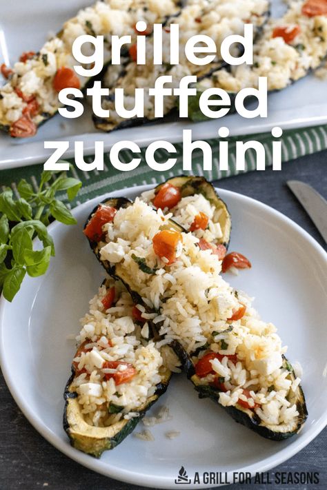 Stuffed Zucchini with rice is a great way to make a flavorful dish. Made with zucchini halves stuffed full of rice, feta, tomatoes, & basil. You'll love the flavor of this simple dish. Rice Stuffed Zucchini, Stuffed Zucchini Boats With Rice, Vegetarian Zucchini Boats, Grill Meals, Stuffed Zucchini Boats, Stuffed Zucchini, Joy Filled Eats, Creamy Rice, Zucchini Boats