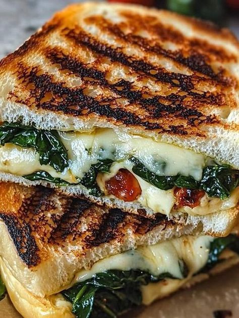 Mediterranean Spinach Grilled Cheese: Flavorful Fusion! - NewsBreak Sandwich On Sourdough, Spinach Grilled Cheese, Mediterranean Grilled Cheese, Banana Crumble, Pickled Eggs Recipe, Cooking Spinach, Steak Bites Recipe, Weight Watchers Tips, Christmas Punch Recipes