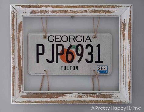 Frame a license plate with twine stapled to the inside of a glassless frame. Framed License Plates, Display Old License Plates, License Plate Ideas Room Decor, How To Display License Plates, License Plate Wall Art, Framed License Plate Wall Art, License Plate Wall Ideas, What To Do With Old License Plates, License Plate Display