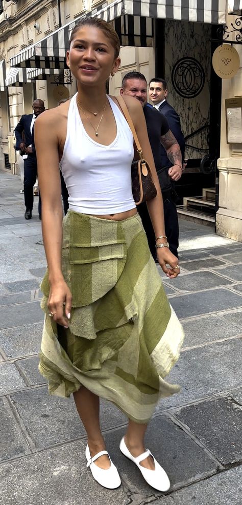 Zendaya Frees the Nipple in a See-Through Crop Top Zendaya Style Street, Zendaya Nails, Zendaya Street Style, Halter Tops Outfit, Asymmetrical Maxi Skirt, Zendaya Outfits, 2024 Olympics, Zendaya Style, Fashion Newsletter