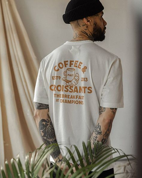 P&Co on Instagram: “A combination we're here for ☕️ 🥐  ​ ​Shop graphic t-shirt including our Coffee & Croissants tee online now.  ​ ​” Off White Graphic, Relaxed Fit Men, Foodie Design, Layering Hoodies, Coffee Graphic Tee, Overalls Men, Coffee Club, Baby Fits, Coffee Tshirt