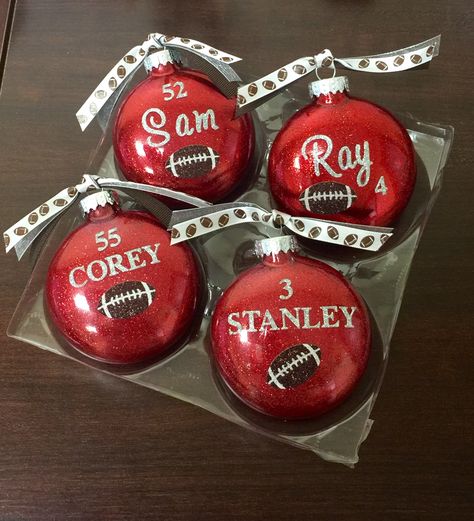 Handmade football ornaments given to players at banquet. Football Team Ornaments Diy, Football Christmas Ornaments Diy, Football Banquet Gifts, Diy Football Ornaments Ideas, Football Diy Gifts, Diy Football Ornaments, Football Ornaments Diy, Football Banquet Gifts For Players, Diy Football Gifts