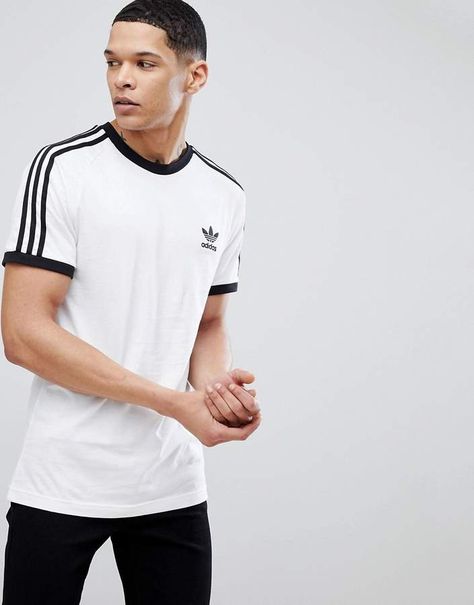 adidas Originals adicolor California T-Shirt In White CW1203 Looks Adidas, Adidas Tshirt, Adidas Retro, White Tshirt Men, Evolution Of Fashion, Adidas Original, Adidas Shop, Men Fashion Casual Outfits, Sports Wear