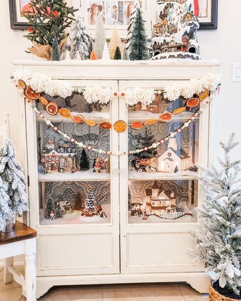 Christmas Village Hutch Display, Hutch Garland, Diy Bead Garland, Diy Orange Garland, Bead Garland Diy, Orange Garland Diy, Diy Pom Pom Garland, Hutch Display, Garland Diy