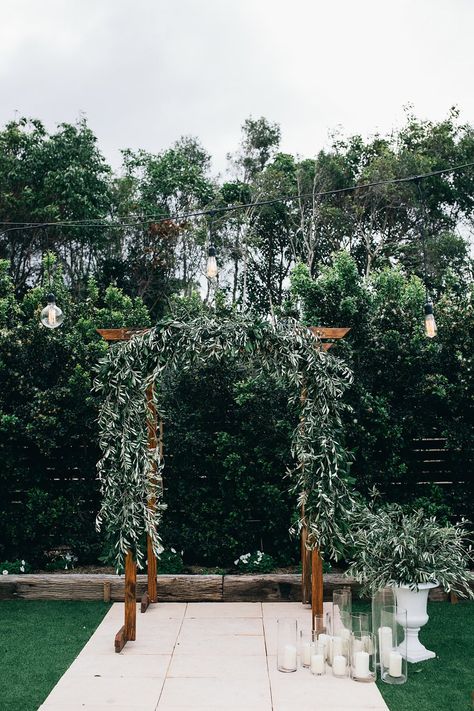 We were lucky enough to be one of the first to spend an evening at Osteria’s beautifully transformed garden. Shot by Figtree... Italy Inspired Wedding, Branches Wedding Decor, Pergola Wedding, Branch Arch Wedding, Copper Wedding Arch, Olive Foliage, Olive Branch Wedding, Olive Wedding, Wedding Branches