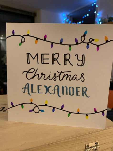 Merry Christmas Alexander - Personalised Christmas card with fairy lights #lettering #calligraphy #handmadecards #cards #christmas Cute Ways To Write Merry Christmas, Calligraphy Christmas Cards, Christmas Card Writing, Picture Invitations, Handwritten Christmas, Merry Christmas Calligraphy, Name Drawings, Christmas Calligraphy, Brother Christmas