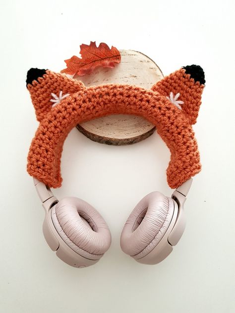 To bring a little comfort when wearing headphones while giving it a little magic, I created this collection of crocheted headphone covers. several models to choose from. They attach around the helmet using a Velcro fastening system. two sizes available: - for helmets whose width at the top of the head does not exceed 3 cm - for gaming headsets whose width at the top of the head does not exceed 4.5 cm if you have the slightest doubt about the size contact me so that we can see it together restocked every Monday Crochet Projects For Absolute Beginners, Crochet Motorcycle Accessories, Fox With Headphones, Headset Crochet Cover, Crochet Animal Accessories, Crochet Headset Cover Free Pattern, Crochet Mushroom Free Pattern, Crochet Headphones Accessories, Headphones Cover Crochet