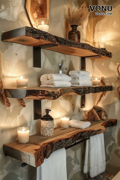 Rustic bathroom shelves made from natural live-edge wood, adorned with towels, candles, and decorative items, creating a warm and cozy atmosphere. Bathroom Rustic Shelves, Diy Wood Bathroom Decor, Wood Bathroom Aesthetic, Log Shelves Rustic, Small Bathroom Ideas Natural Wood, Unique Bathroom Shelves, Hunters Bathroom Ideas, Rustic Wood Interior Design, Candles On Shelves