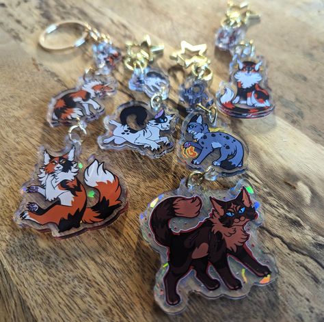 Inspired by the villians of your favourite Battle Cat books, we have linked charms featuring some of these iconic villians! Mapleshade Darktail Sol Ashfur Ashfur & the Imposter These charms include one 1 inch charm and one 1.5 inch charm [ and an extra 2inch for the Imposter], with double sided printing and holographic material on one side! Due to the fragile nature of these charms, be aware that these are not suited to places of high wear and tear, as the charms may break. These are best as dis Sol Warrior Cats, Cat Mask Diy, Holographic Material, The Imposter, Warrior Cats Books, Fandom Drawing, Sun And Moon Drawings, Warrior Cats Art, Moon Drawing